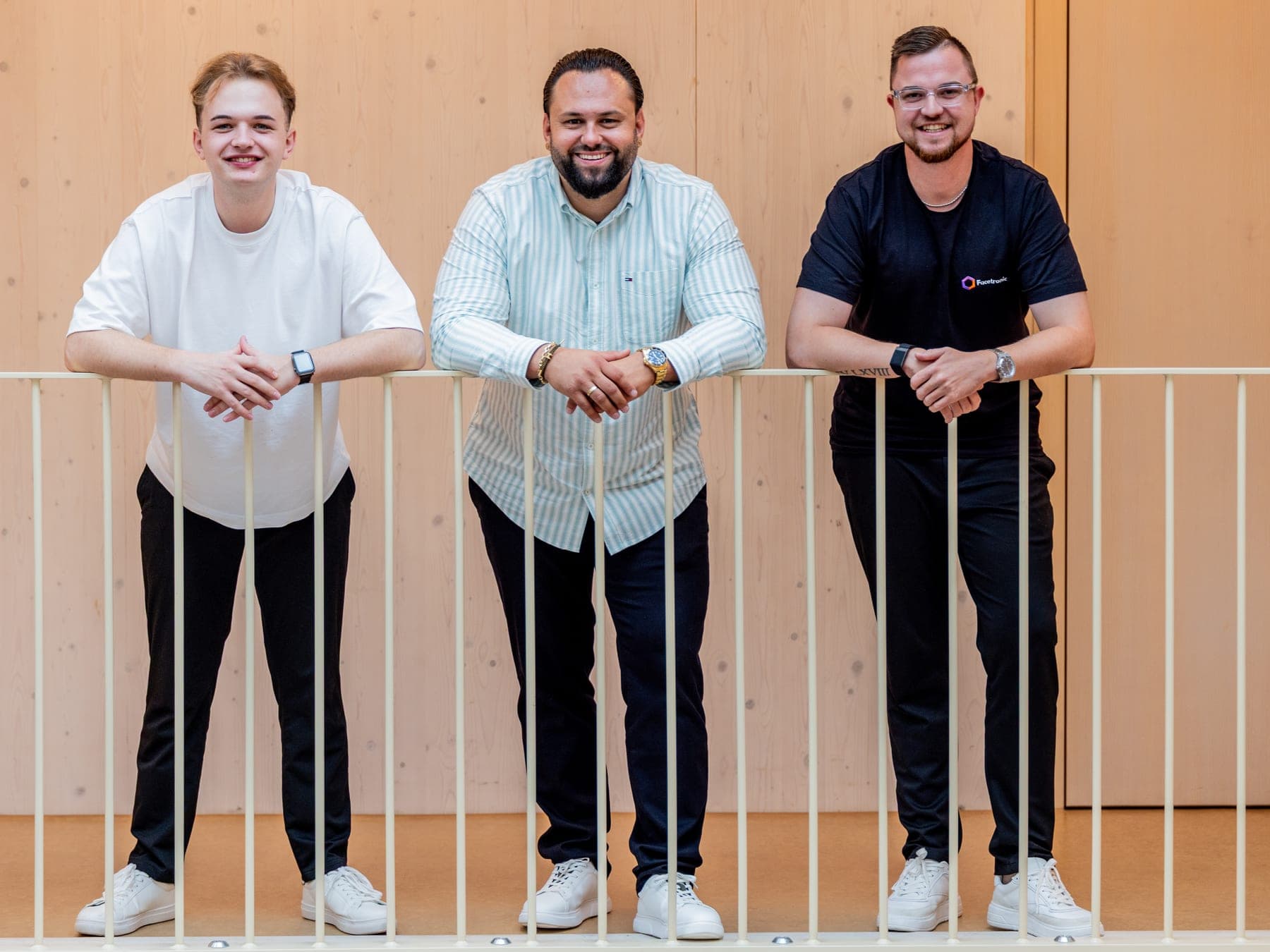 The three of the Facetronic team on the gallery at the office in Heilbronn